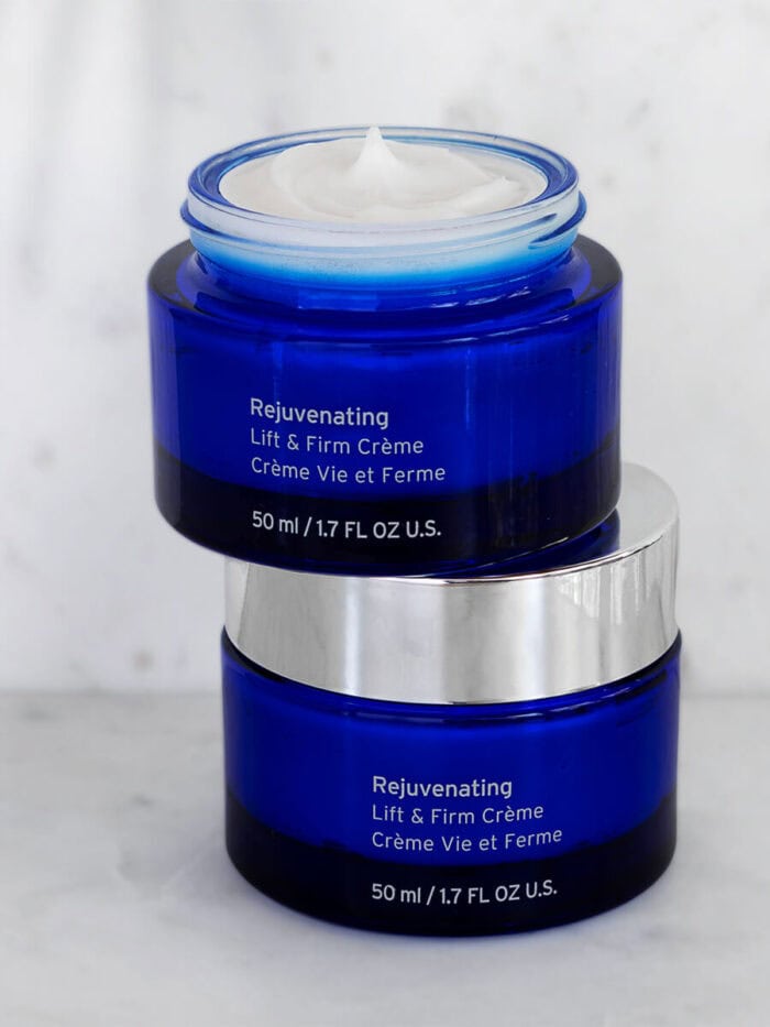 Rejuvenating Lift and Firm Creme containers stacked on top of each other.
